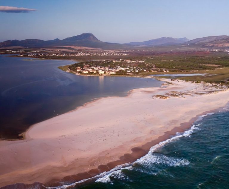 Landscape of Bot River Lagoon with mountains and ocean near Hermanus South Africa
