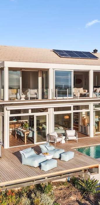 Exterior of MBIZI lagoon house Exterior of MBIZI lagoon house: modern open architecture with views over Kleinrivier Lagoon, Hermanus