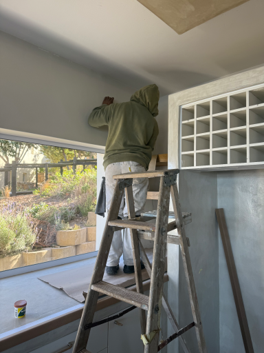 Custom built-in shelving and carpentry during the interior renovation of MBIZI lagoon house, Hermanus