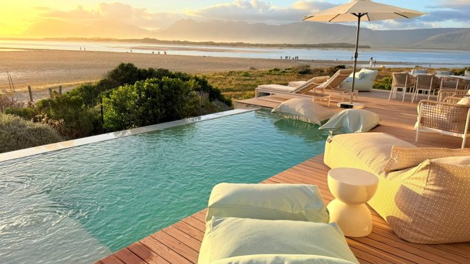 Swimming pool with lagoon and ocean views at MBIZI lagoon house