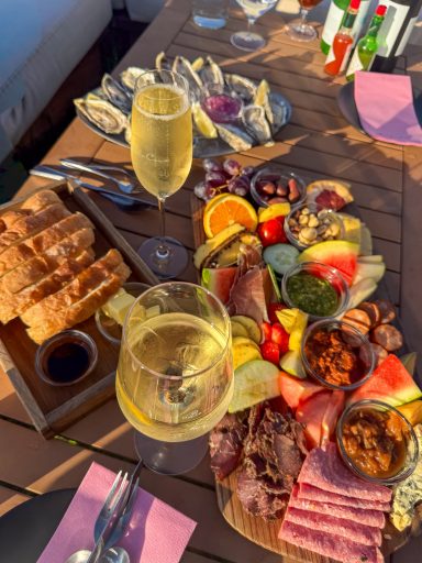Outdoor wine and food pairing at a scenic Overberg wine estate near Hermanus, South Africa