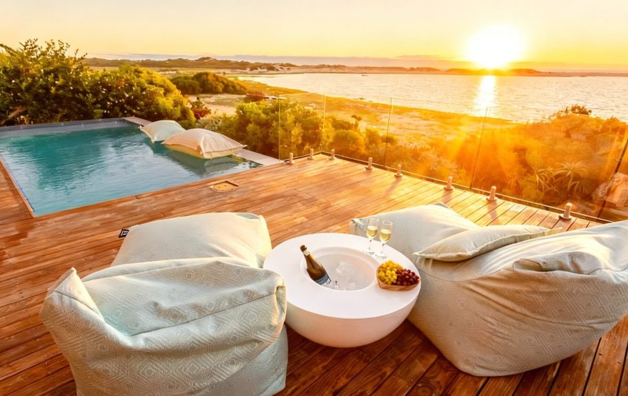 Comfortable outdoor lounge at MBIZI lagoon house — the perfect spot to relax with lagoon views