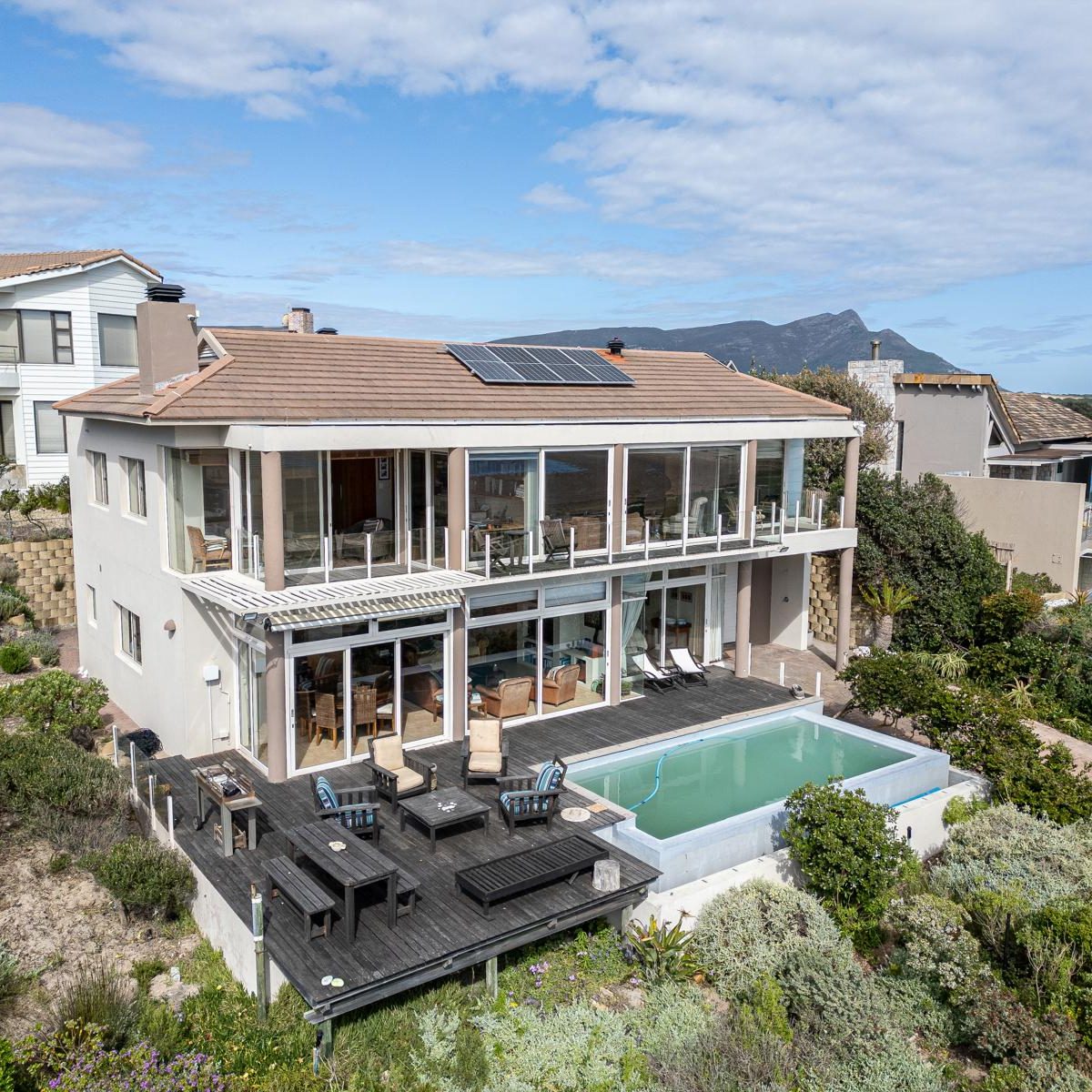 MBIZI lagoon house original exterior before renovation — house 34 in Fisherhaven near Hermanus